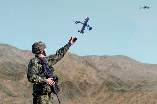 Counter Drone - image of solider launching counter drone into sky