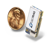 Spyr Image comparing size of GeoTraq module with penny.