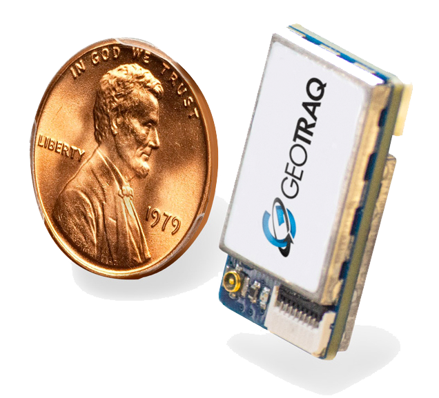 Image comparing size of GeoTraq module with penny.