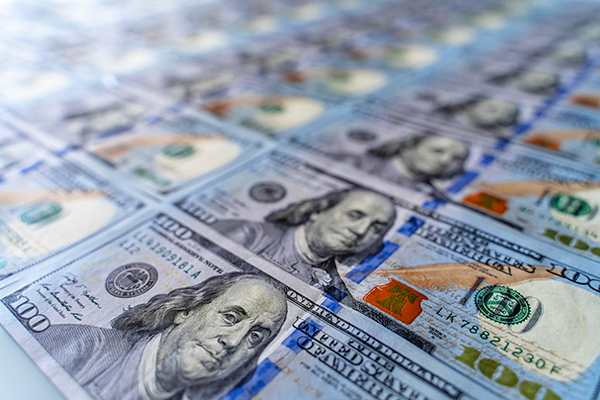 Image of $100 american dollars bills background.