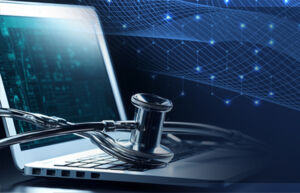 MedBright image - Image of laptop and stethoscope on digital background.