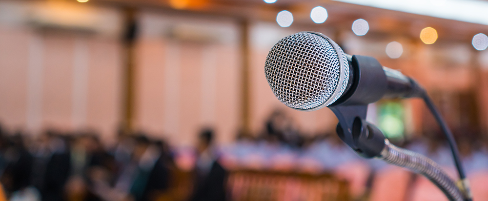 Image of microphone abstract prepare for speaker speech of conference or seminar hall at exhibition room background.